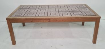 20th century coffee table, the rectangular top inset with tiles, on a teak frame, 113.5cm x 40cm