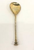 Guild of Handicraft silver-gilt seal-top rattail preserve spoon, London 1957, inscription to