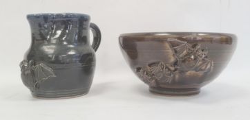 Studio pottery bowl, circular with relief decoration of bats in flight, marked to base and