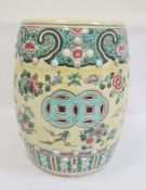 Chinese porcelain garden seat, barrel-shaped, decorated with peony border, floral sprays to a yellow