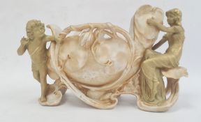 Austrian Royal Dux-style tinted bisque vase, waterlily embossed and supported by pair water