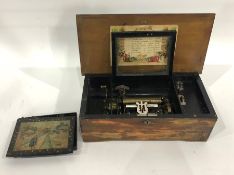 Cylinder musical box playing eight airs and having 11