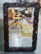 Rectangular mirror in the Chinese-style with carved frame, 58cm x 90cm