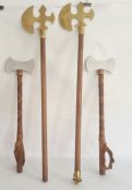 Two pairs of wood and metal reproduction axes, one pair having decorative trefoil shape