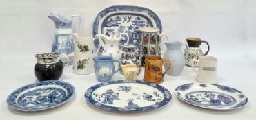 'Old Willow' pattern oval dish, a blue and white meat plate, a blue and white jug, other Victorian