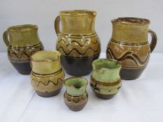 Sidney Tustin for Winchcombe pottery jug in green and brown glaze, 9.5cm high, Winchcombe pottery