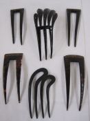 Two pairs of gold pique work and tortoiseshell hair combs (some damage) and two other hair combs