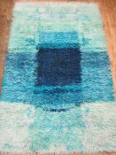 Two 1970's turquoise and blue shag pile rugs , both 155 x 95 cms Condition Reportboth need a