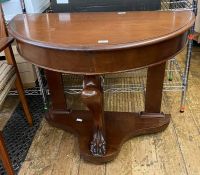 A reproduction demi-lune table, 91cm wide