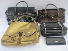 Moschino -  'Love Moschino' black leather bag with gilt chain and leather strap handles, red lining,