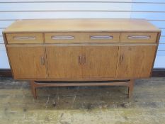 V B Wilkins G-Plan fresco sideboard, four drawers above cupboards on straight supports, 150cm wide