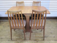 E Gomme for G-Plan set of four teak dining chairs with brown upholstered seats, label to