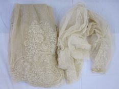 Net and lace skirt from a dress, late 19th century, one ruched sleeve and another short length of