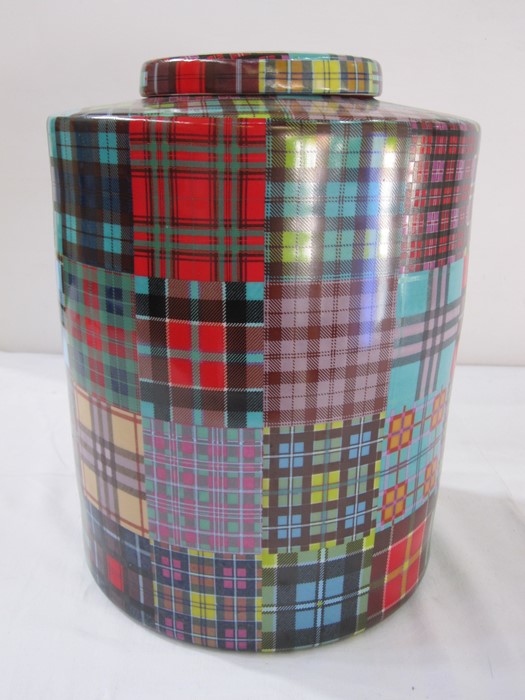 Fabienne Jouvin Paris porcelain covered canister, decorated in bright tartan designs, 31.5 cms high