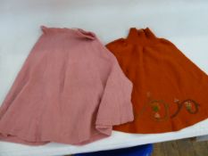early 1970's pink knitted 'skater' skirt, labelled CAZGIN, and an orange knitted mini skirt , with