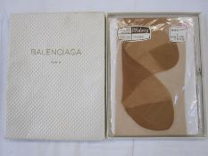 Balenciaga box containing a pair of Wolsey stockings