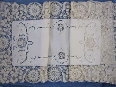 Cotton table runner with bobbin lace fringe with matching place mats and a square net cloth bordered
