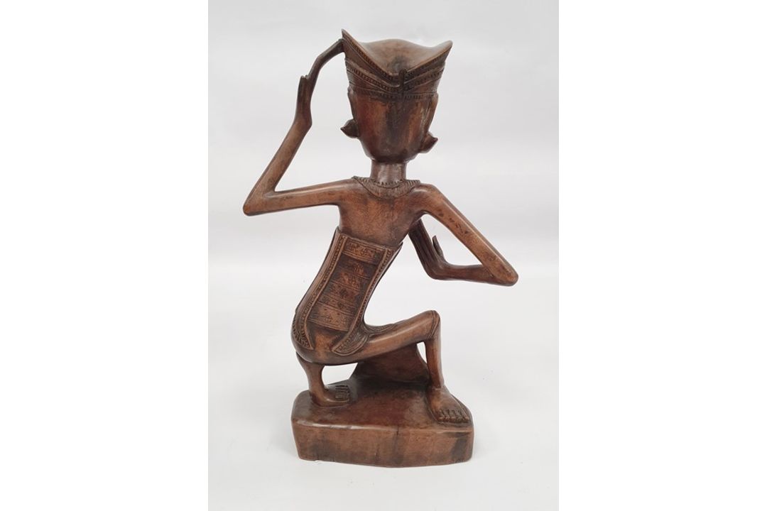 Assorted 20th century Eastern carved figures to include figure in hat carrying jug and basket, - Image 7 of 9