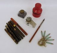 Parker vintage fountain pen in marbled green and black, another Watermans in brown and black scale