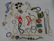 Gilt metal geometric necklace, compact, gilt metal and enamel clown brooch and various other items