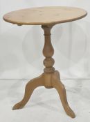 Modern pine occasional table on turned column to three ogee legs