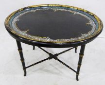 Oval centre table with papier mache and mother-of-pearl inlaid tray top, on ebonised bamboo-effect