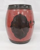 20th century lacquered barrel-shaped Chinese rice box in red and black, with painted fish decoration