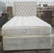 Modern single bed with button upholstered headboard and divan base