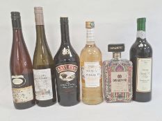 One bottle of Baileys Irish Cream, one bottle of Muscat de Rivesaltes l'Or du Roussillon, one bottle