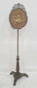 William IV rosewood polescreen with fretwork around the silk screen, triform base