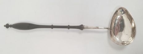 A silver and turned wooden handled punch ladle, possibly Swedish, marks worn, three crown mark, 40.