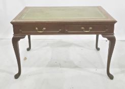 Edwardian library/writing table stamped 'Gillow', with green leather inset top and mahogany frame,