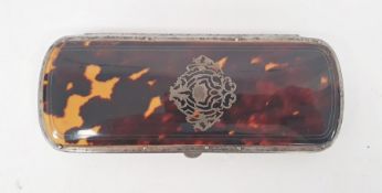 A late 19th century French tortoiseshell and silver pique lorgnette case, silver inlay to lid, red