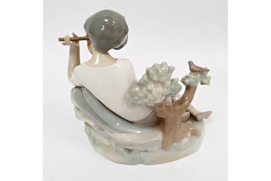 Lladro porcelain figure of boy with flute, 20cm high and another of girl seated with lamb (2) - Image 4 of 10