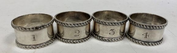 A set of four late 19th century silver napkin rings, numbered 1-4, maker Atkin Brothers, Sheffield
