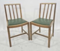 Pair of oak dining chairs with railbacks and curved cresting rail (2)