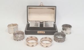 A pair of early 20th century silver napkin rings, scalloped edges, boxed, Birmingham 1929, makers
