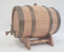 Miniature oak and bound barrel on stand, total height approx. 26cm