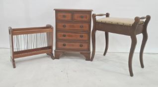 Small chest of two short and three long drawers, on bracket feet, magazine rack and piano stool (3)
