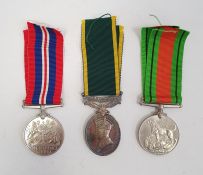 1939-45 Defence medal, 1939-45 War medal and George VI Territorial Efficient Service medal awarded