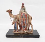 Franz Bergman style coal painted spelter table lighter in the form of Arab carpet seller on camel,