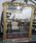Late 19th century large gilt overmantel wall mirror of rectangular form with beaded border and
