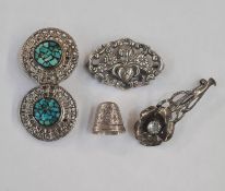 Silver-coloured metal floral brooch, a silver-coloured metal scroll and flowerhead brooch, a foreign