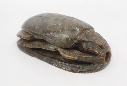 Egyptian carved hardstone scarab, 11cm wide