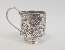 Chinese Hung Chong footed miniature cup, the cylindrical body repousse with dragons, having loop