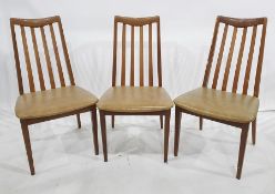 Six 1970's G-Plan teak railback dining chairs with beige leatherette seats, h. 44cmsCondition