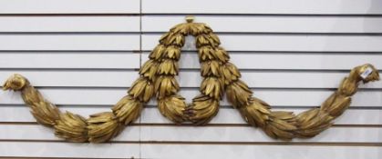 Carved wood and gilt wall-hanging wreath
