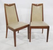 Set of four 1970's G-Plan teak dining chairs with beige leatherette upholstery