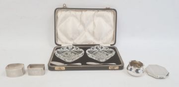 Silver compact, Birmingham 1951, of octagonal engine turned design, two silver napkin rings, small