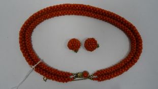 Silver and coral collarette with matching clip-on earrings, all set with multi-beads, the clasp